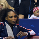 Serena Williams of Team USA, bottom left, along with daughter Alexis Olympia, watches the action during the first round of the 2018 Fed Cup at US Cellular Center on February 10, 2018 in Asheville, North Carolina.